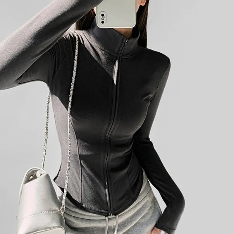 Women's slim fit zip cardigan in Dralon, grey elastic, with flying sleeves and solid colour design.