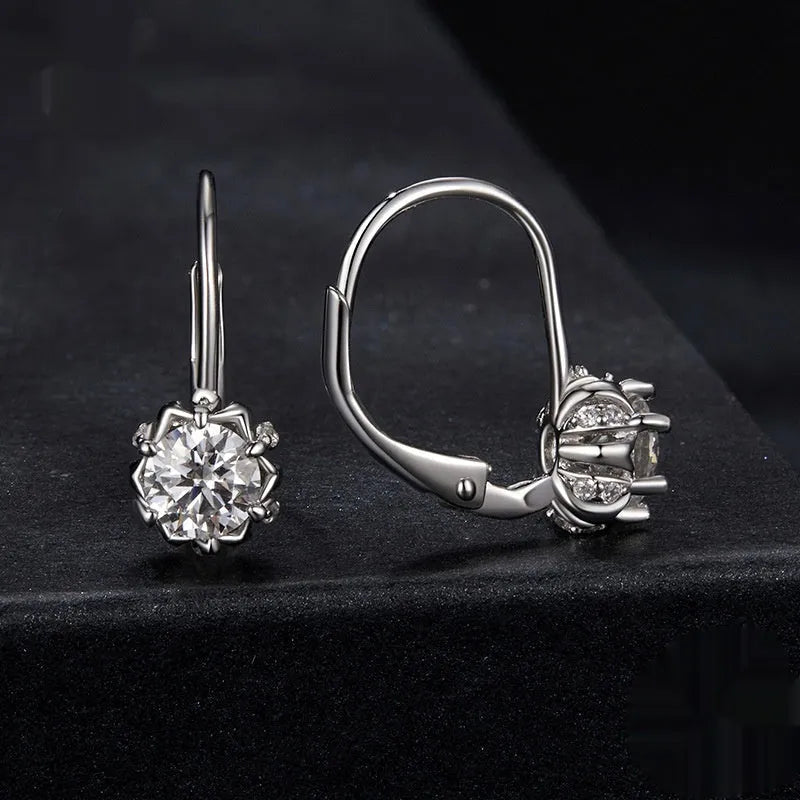 S925 sterling silver flower bud ear clip with moissanite stone and white gold plating.