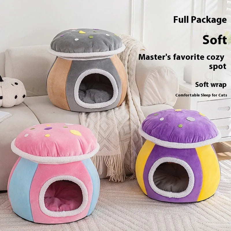 Grey mushroom-shaped plush cat bed on a wooden floor