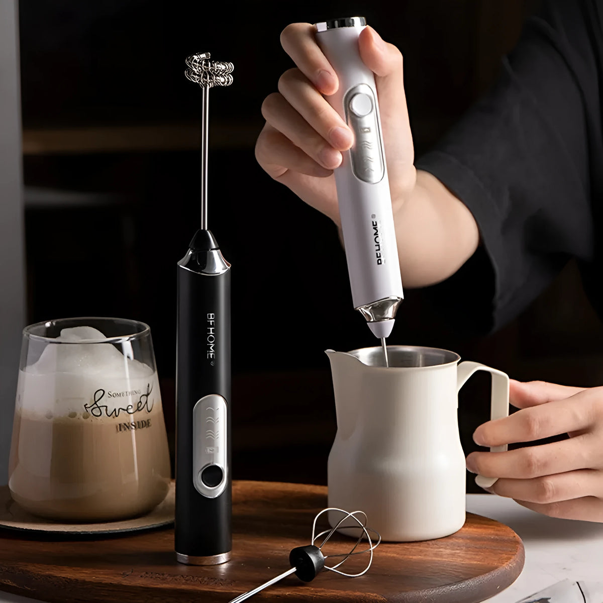 Electric coffee foam maker with USB cable, two brush heads, in black and white solid colours