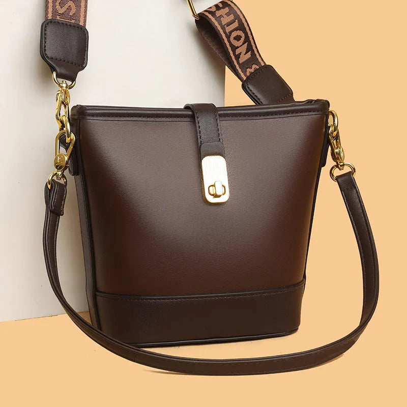 Korean-style soft PU bucket shoulder messenger bag in black colour with double straps and organised interior