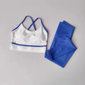 Women's blue and white nylon spandex sleeveless tank top and cropped yoga pants set.
