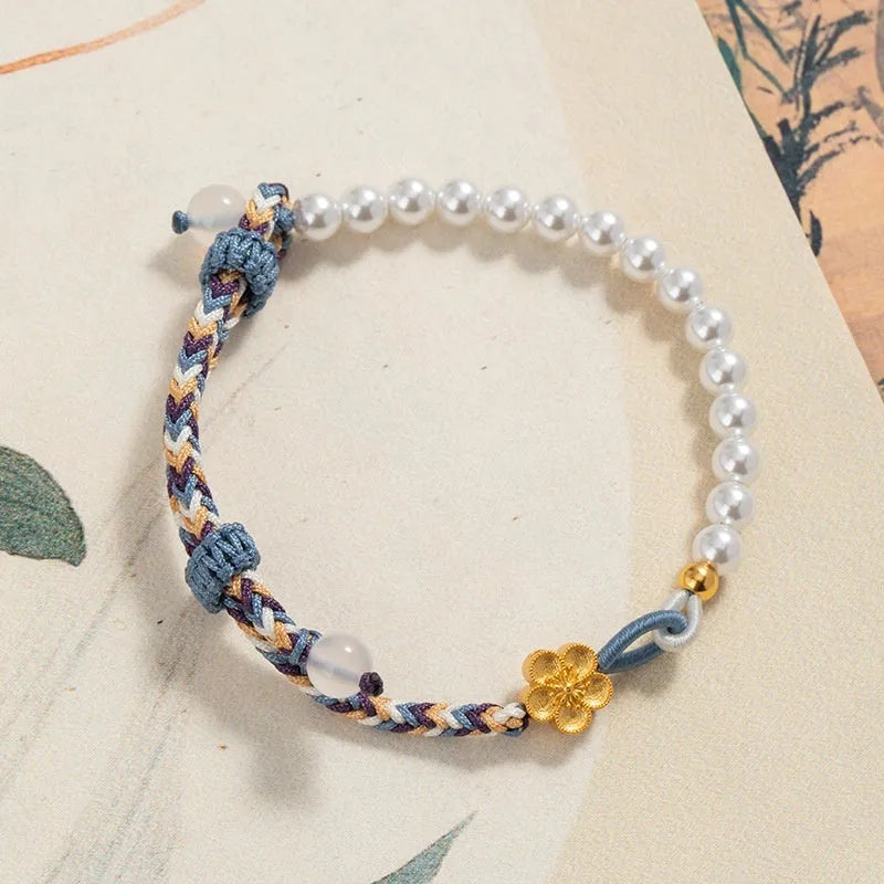 Peach-coloured carrying strap bracelet with Chinese flower weaving pattern featuring sterling silver and chalcedony beads
