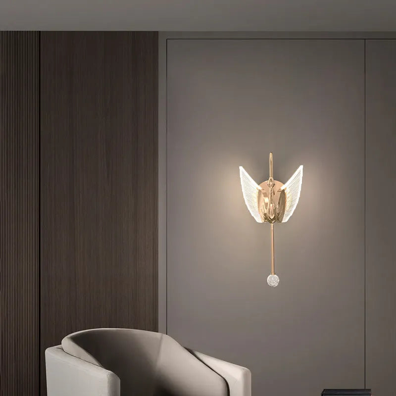 Modern minimalist gold swan wall lamp with acrylic shade showing tricolour LED light options for bedroom bedside use