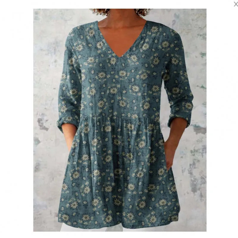 Women's printed loose wave dress with 3/4 sleeves and wide waist in colourful pattern