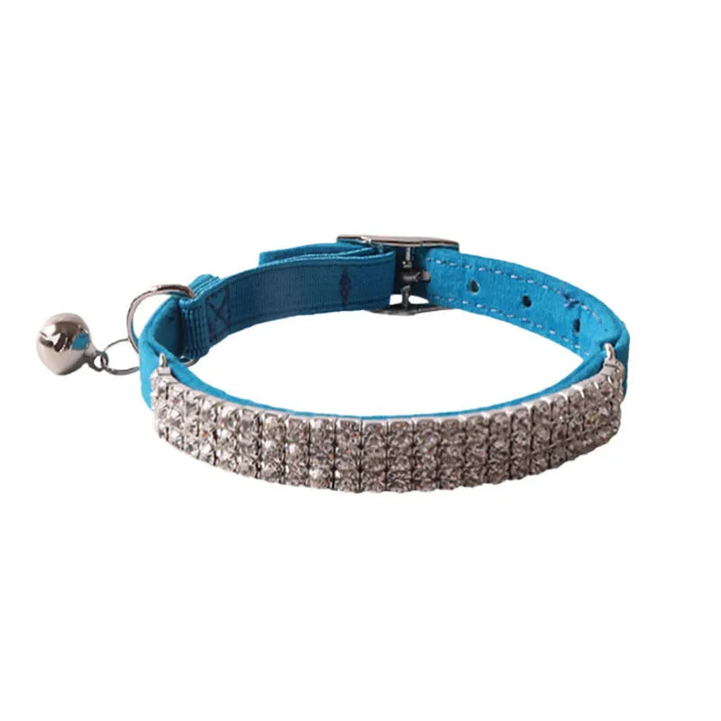 Soft flocked flannel cat collar with elastic buckle in six colour options.
