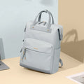 Women's large synthetic leather backpack in apricot colour with adjustable shoulder strap.