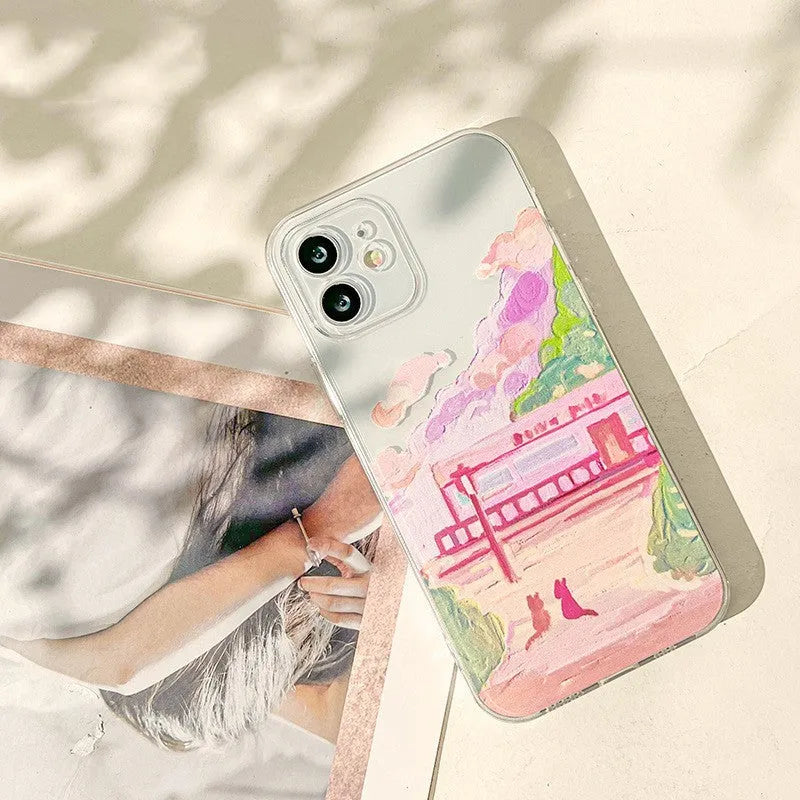 Soft silicone iPhone case with a colourful two cats cartoon design on the back.