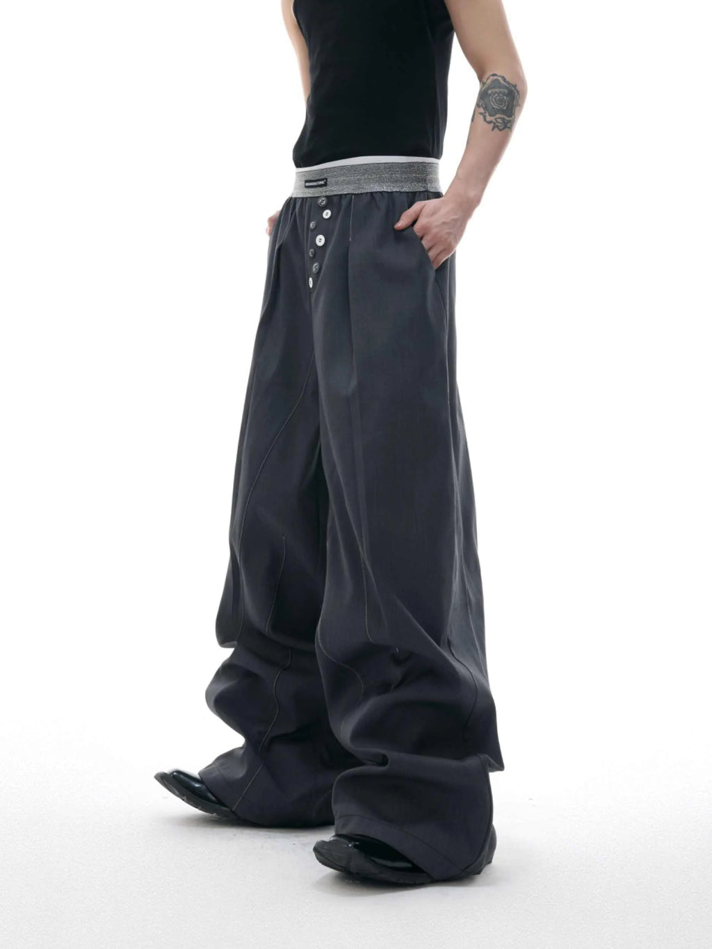 Straight-leg high-waisted casual trousers with button open line detail in black and grey colours