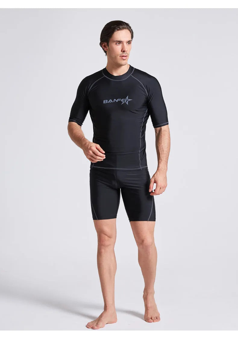 Men's blue half-sleeve quick-dry nylon swimsuit top and pants set for swimming and surfing.