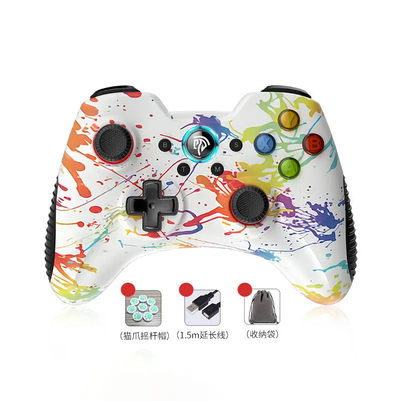 Black dual-mode wireless game controller for PC with coloured action buttons, shown with USB dongle and spare thumbstick caps.