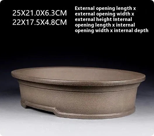 Handmade antique oval purple sand ceramic bonsai pot, 25cm long by 21cm wide.