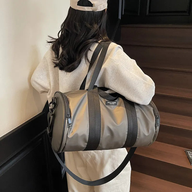Waterproof Oxford cloth sports handbag in black, dark gold, or dark grey for men and women leisure travel