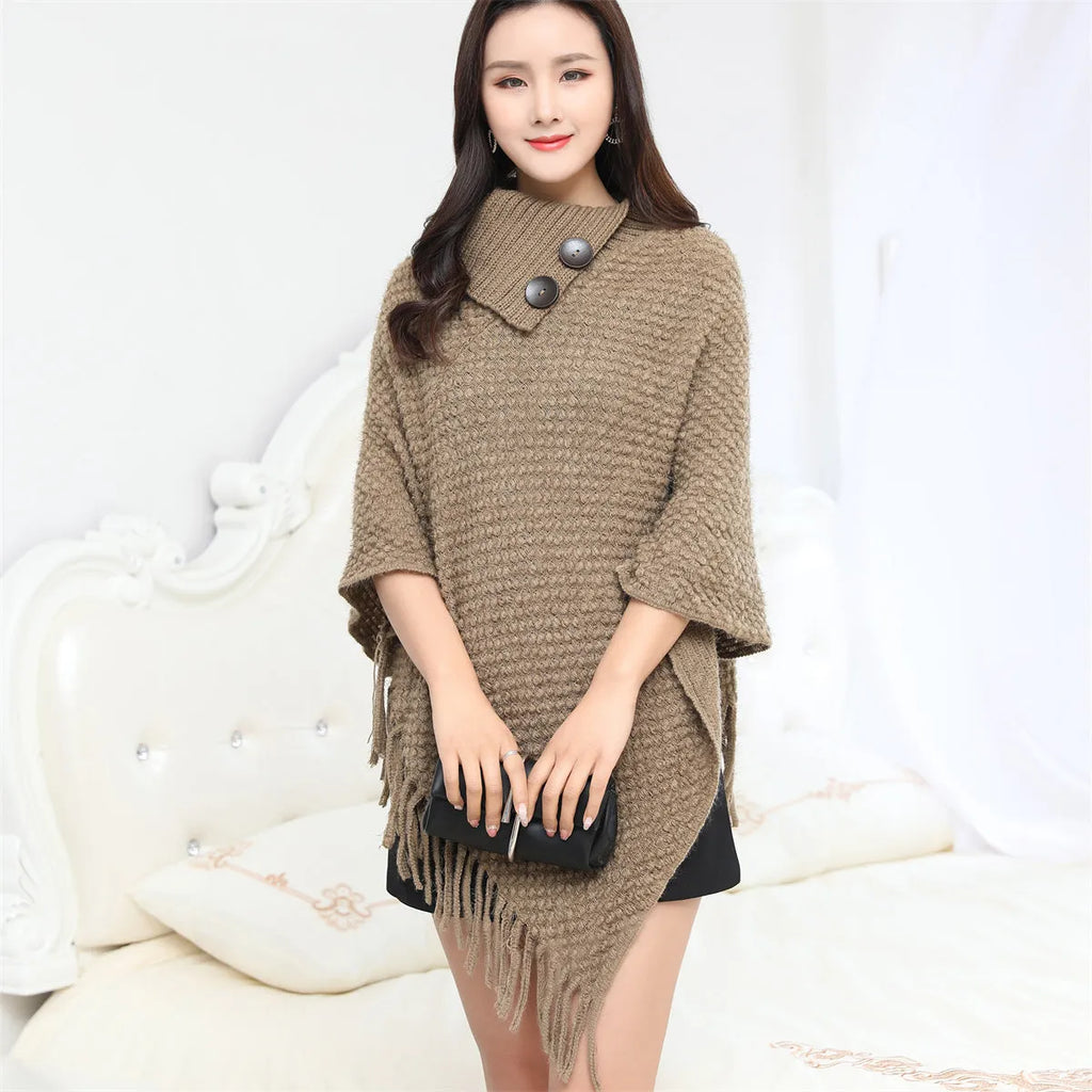 Women's sleeveless knitted cloak shawl with dot pattern in apricot colour