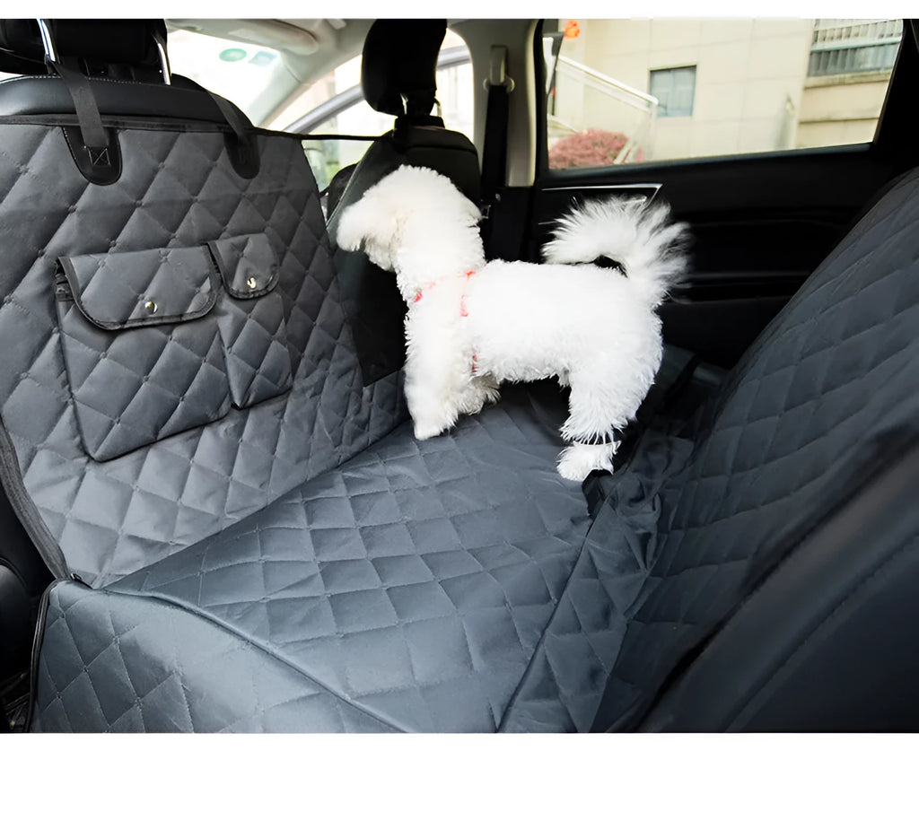 Black polyester two-seater car rear pet mat, waterproof and scratch-resistant, laid across a car seat