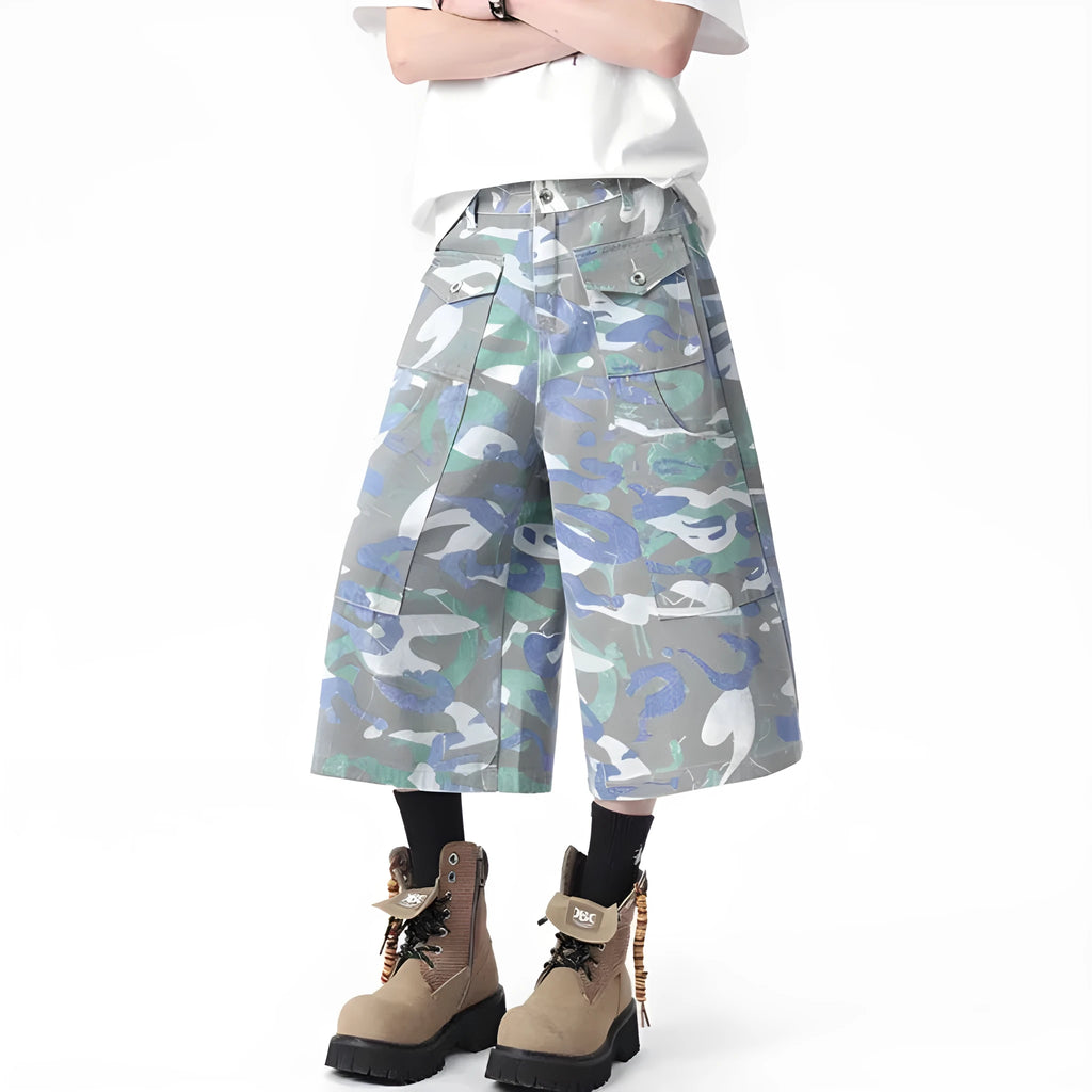 Camouflage denim work trousers with cargo pockets and straight leg cut