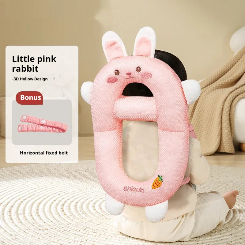 Baby wearing cartoon dinosaur anti-collision pillow for toddler fall protection