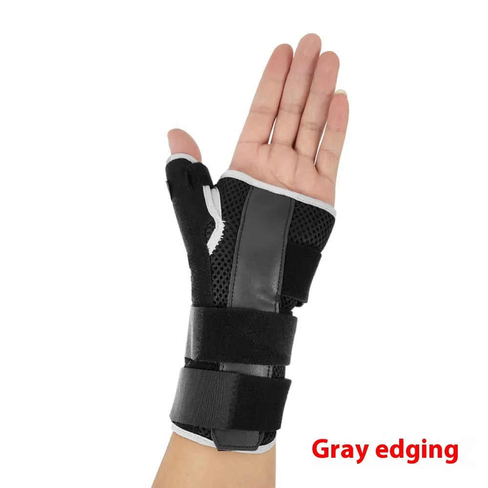 Black carbon fibre wrist guard with thumb strap and grey edging, shown for left hand.