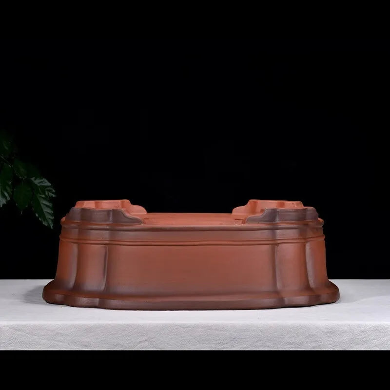 Large Chinese style purple clay flowerpot with antique jade finish and tree stump decoration