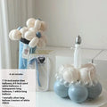 DIY balloon bouquet cake decoration kit with assorted balloons for creating a round cake topper.