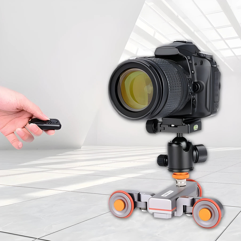 Wolf King L4X mobile camera remote control slide car with black body and silver remote on a tabletop