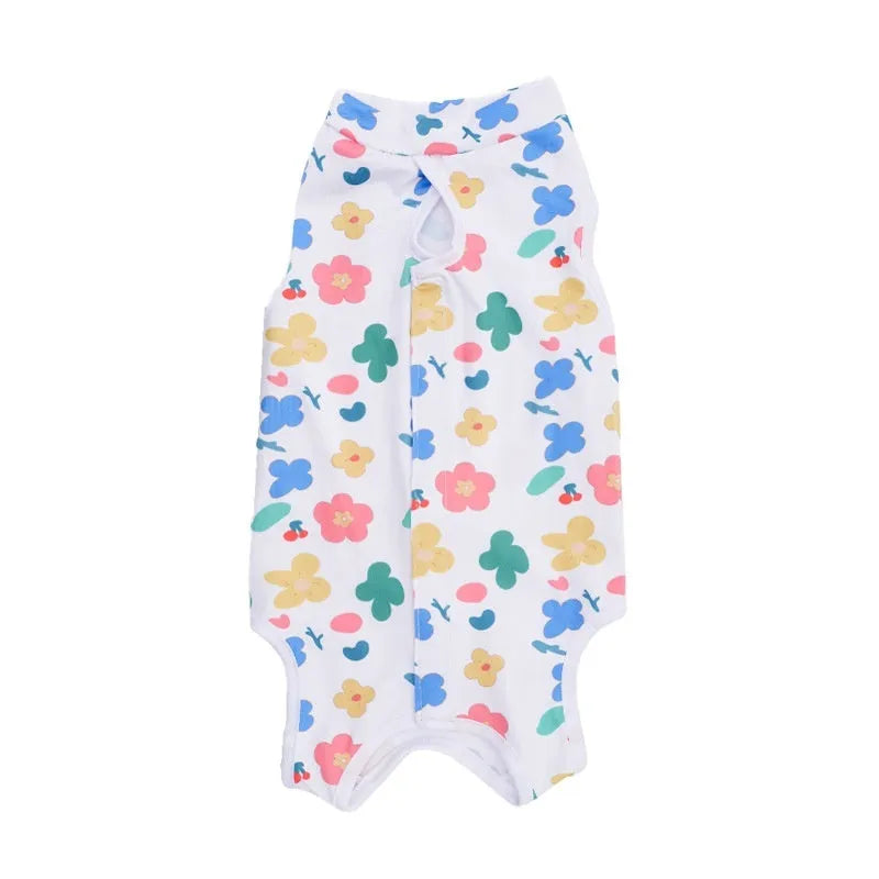 Cat wearing sterilisation recovery suit with Velcro closure in colourful print design