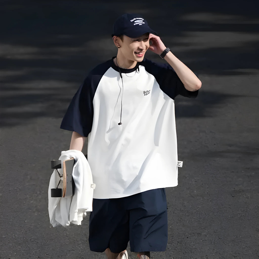 Men's blue casual Japanese-style T-shirt with raglan sleeves on a hanger