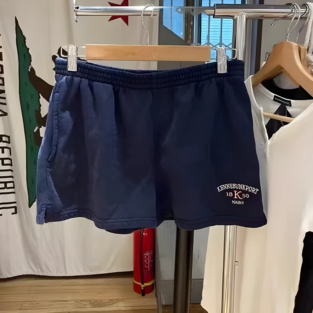 Dark blue women's high top sports hot pants with white flag embroidery and cotton fabric texture