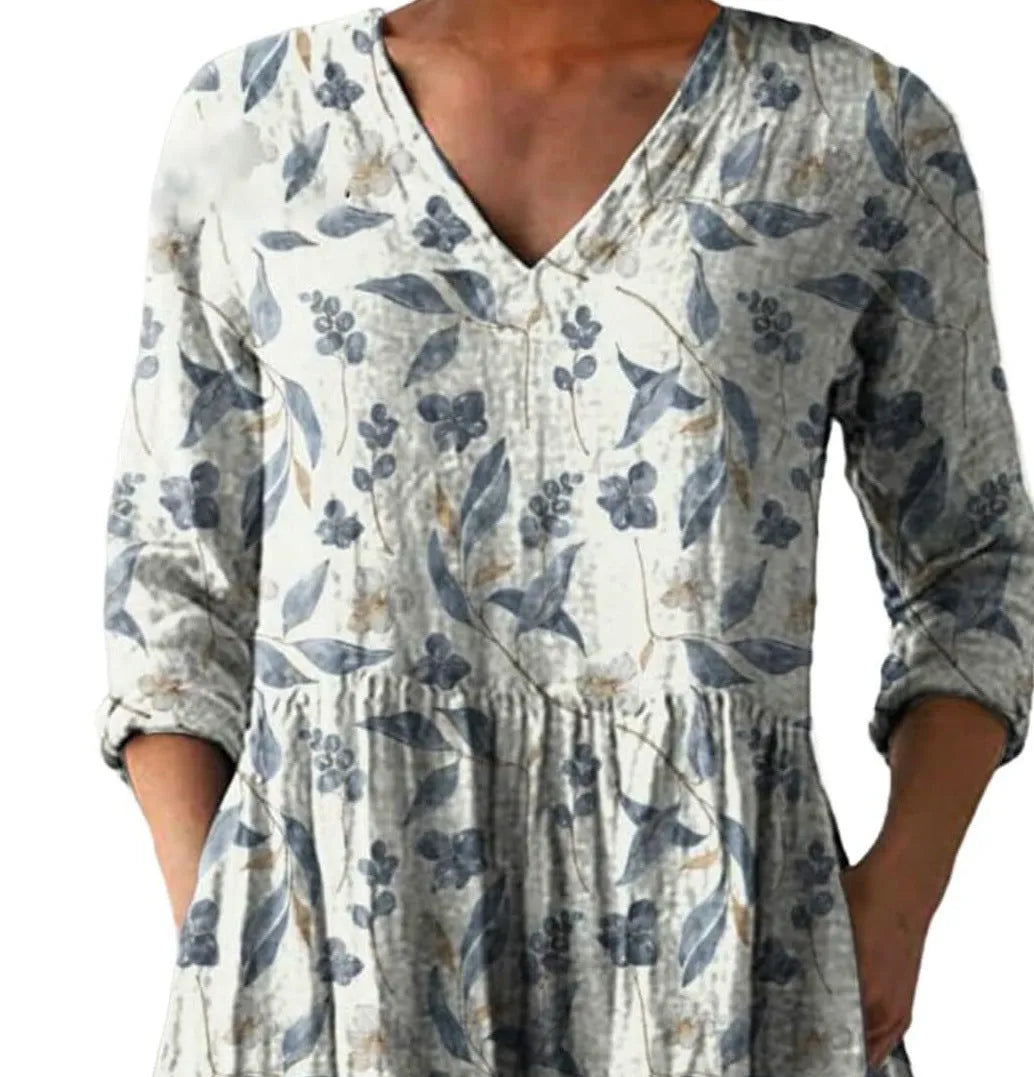 Women's printed loose wave dress with 3/4 sleeves and wide waist in colourful pattern