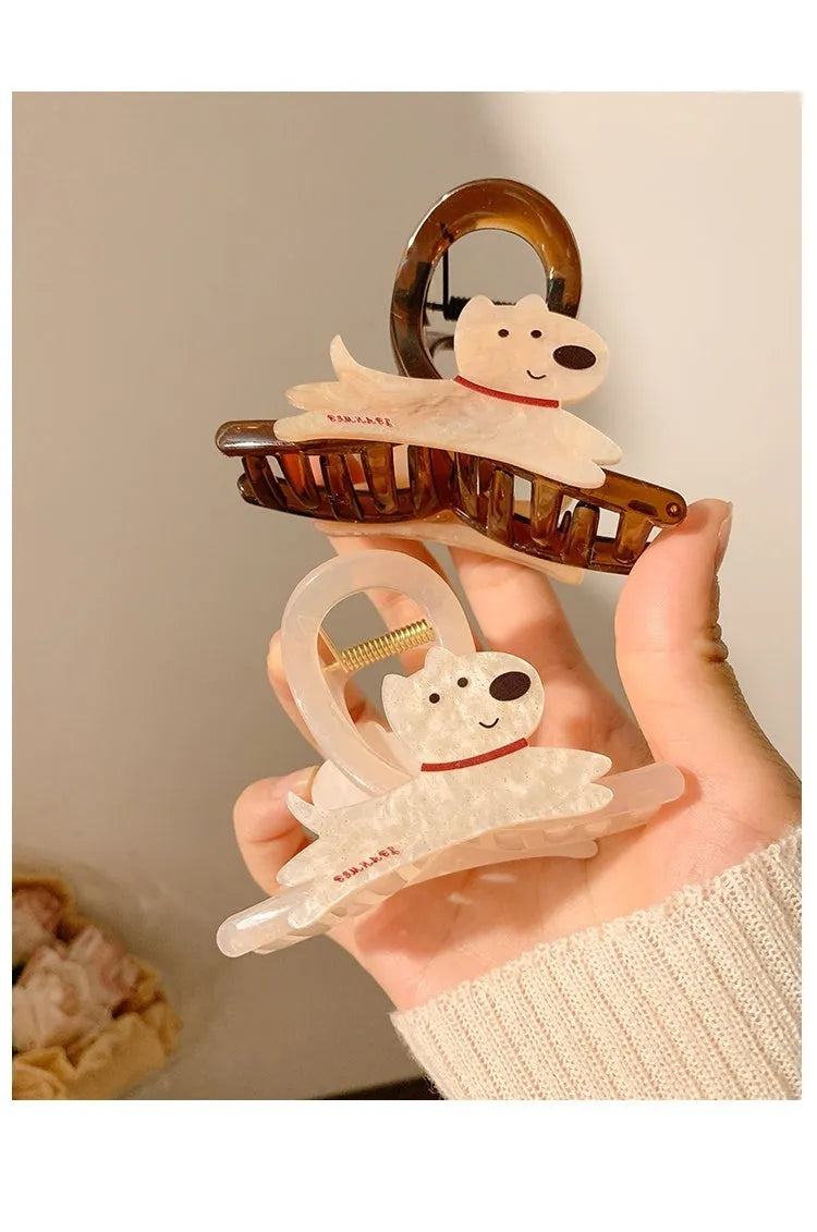 Cartoon puppy hair barrettes in beige and brown colours showing Korean style designs