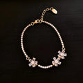 Gold-plated copper women's bracelet with geometric design and zircon gemstone accents