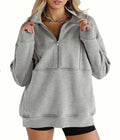 Women's loose polyester brushed hoody with zipper pocket in street hipster style, roomy fit, thick fabric