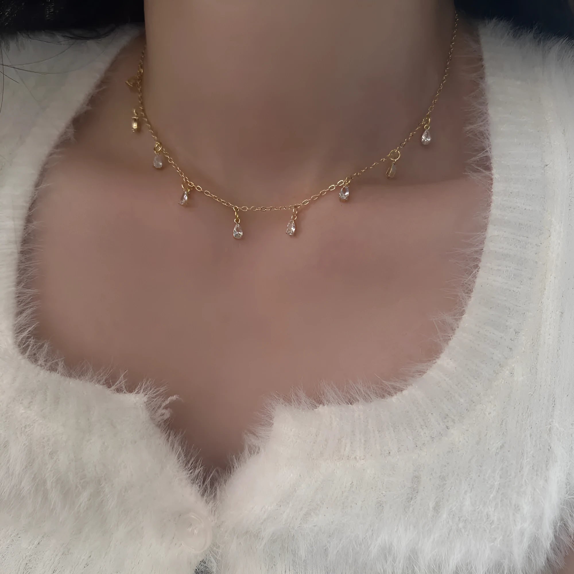 Three-piece zircon jewellery set for women showing necklace, earrings, and anklet with geometric meteor shower design.