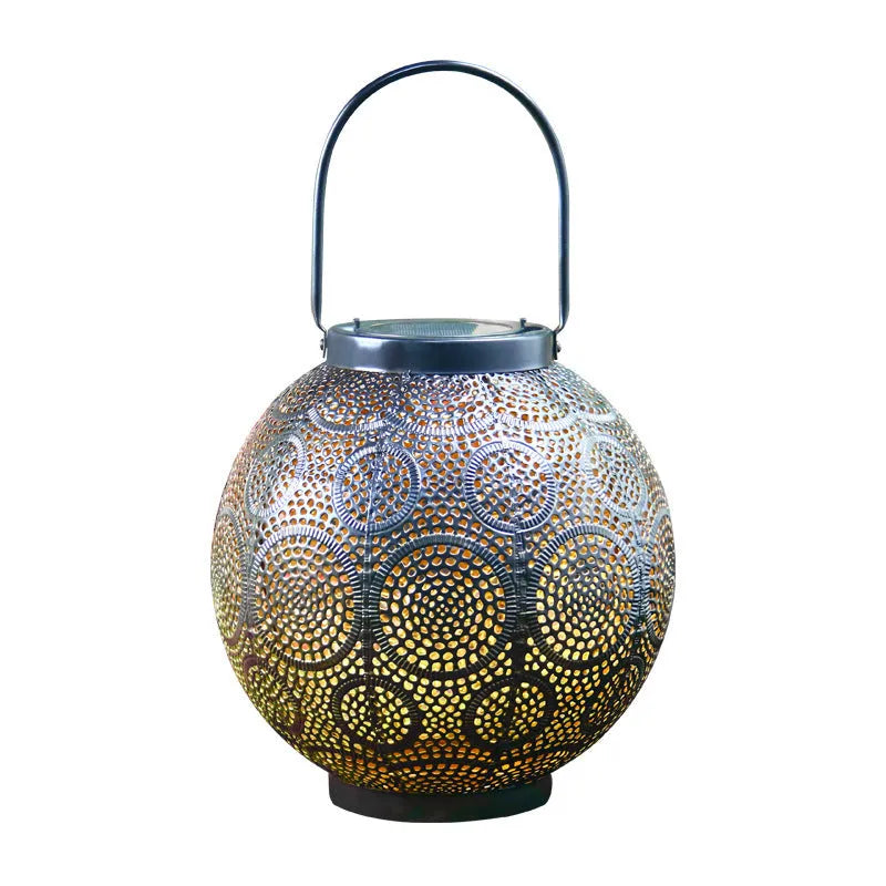 Hollow decorative iron solar lamp for outdoor courtyard use