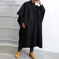 Men's solid black hooded cloak coat with loose streetwear punk fit, front view