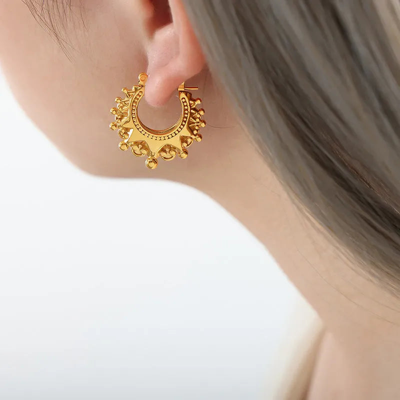 Titanium steel ball-shaped safety lock earrings in gold or steel with U-shaped electroplated finish