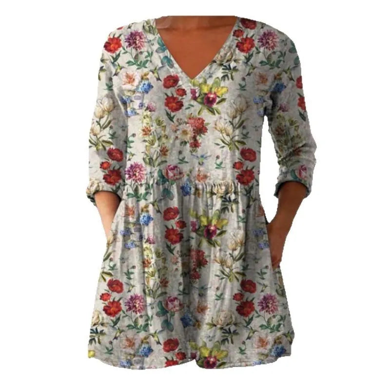 Women's printed loose wave dress with 3/4 sleeves and wide waist in colourful pattern