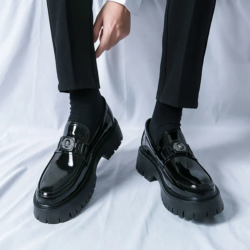 Men's glossy black platform loafers with a low hidden heel for summer wear.