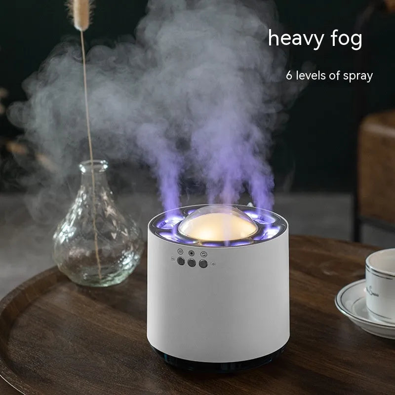 Simple white column desktop humidifier with colourful ambient lighting and six ultrasonic spray ports, 800mL tank, USB powered.