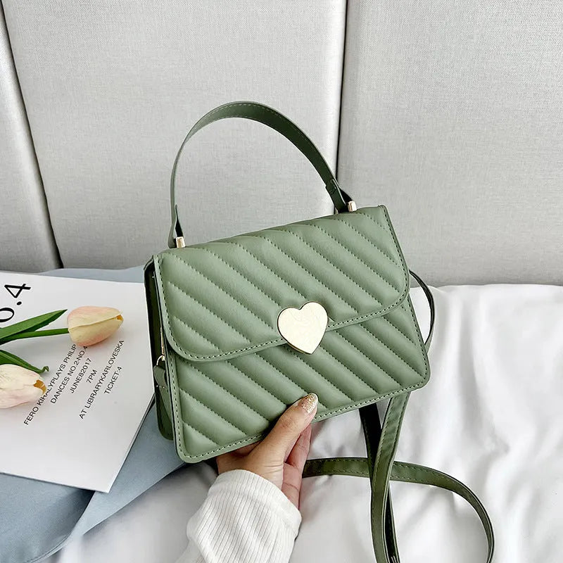 Women's PU diamond lattice crossbody handbag with magnetic buckle, 21cm wide, 110cm strap, in beige.
