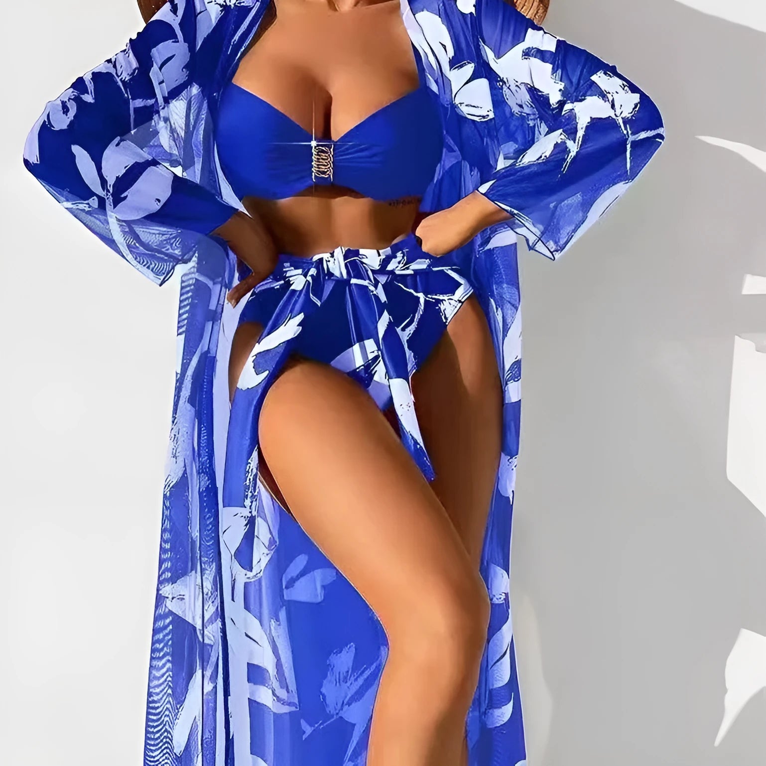 Women's three-piece printed swimsuit set with long shirt, high-waist panties, and bikini top in black