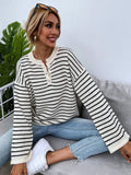 Black striped women's drop-shoulder long sleeve top with button detail