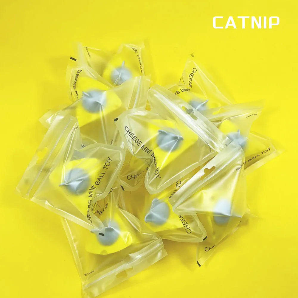 Yellow catnip toy balls for indoor cats with dental chew benefits