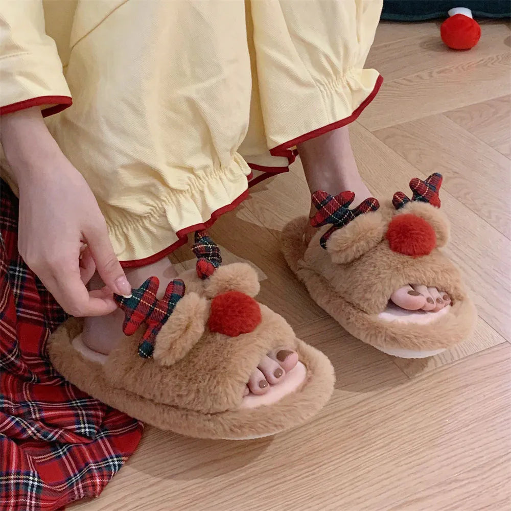 Brown women's indoor slippers with cartoon deer design, suede upper, and PVC sole