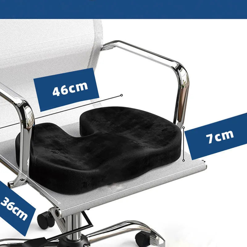 Black U-shaped memory foam seat cushion for office chair tailbone support.