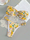 Colourful floral print bikini set with tube top and briefs on a hanger.