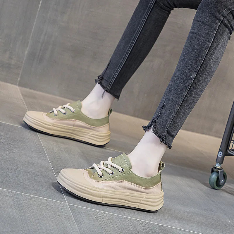 Women's solid colour leather platform sneakers in matcha, purple, or orange with a round toe and lace-up front.