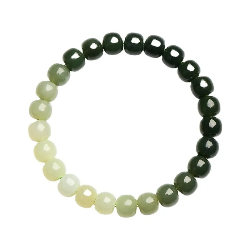 Polished Hetian jade bracelet with gradient clear water colour and round beads.