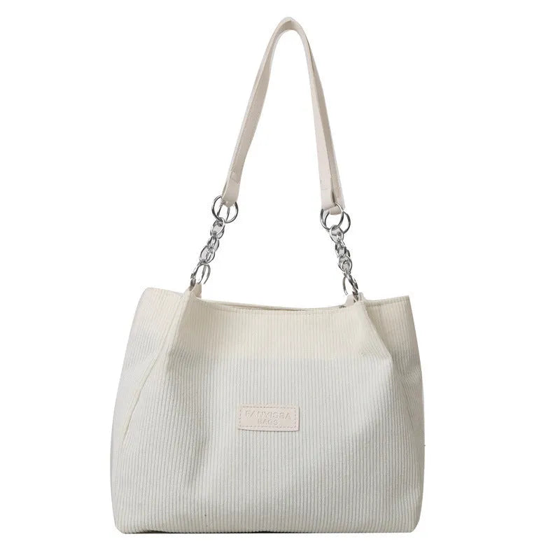 Corduroy one-shoulder tote handbag in square design with three-dimensional pocket