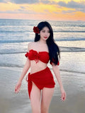 Red women's bikini swimsuit with puff sleeve skirt design in nylon fabric